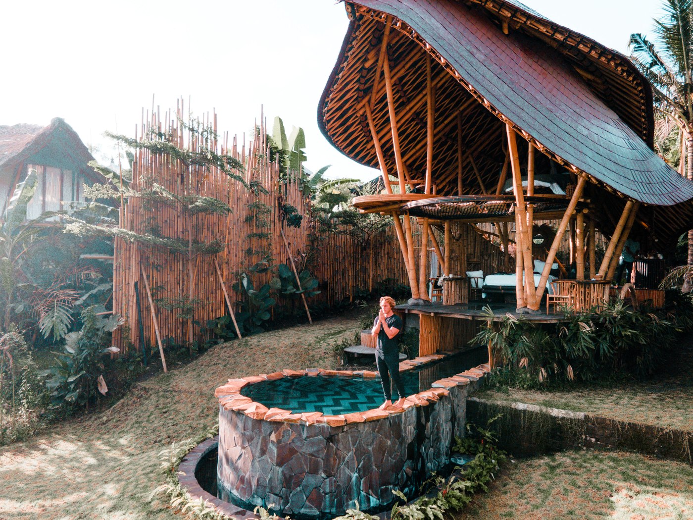 A striking bamboo-roofed villa with a plunge pool, Bali
